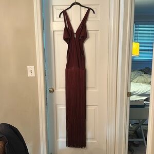 Size Medium NEVERWORN Herve Leger dress. Tags on and is in perfect condition.